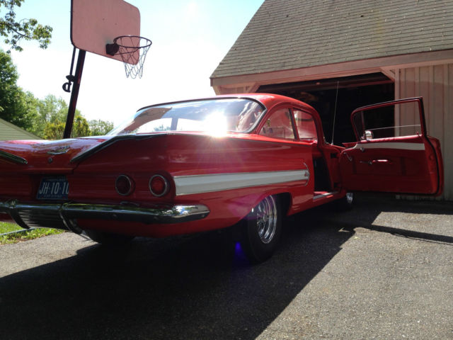 Red 1960 Chevrolet Bel Air/150/210 2 Door Post with Red/White interior