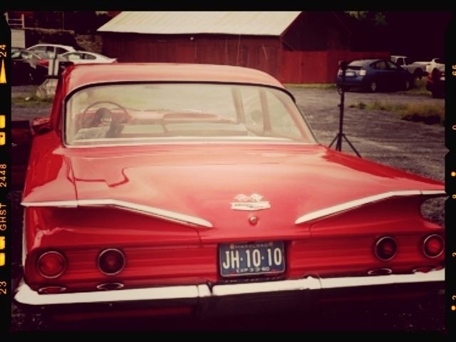Red 1960 Chevrolet Bel Air/150/210 2 Door Post with Red/White interior
