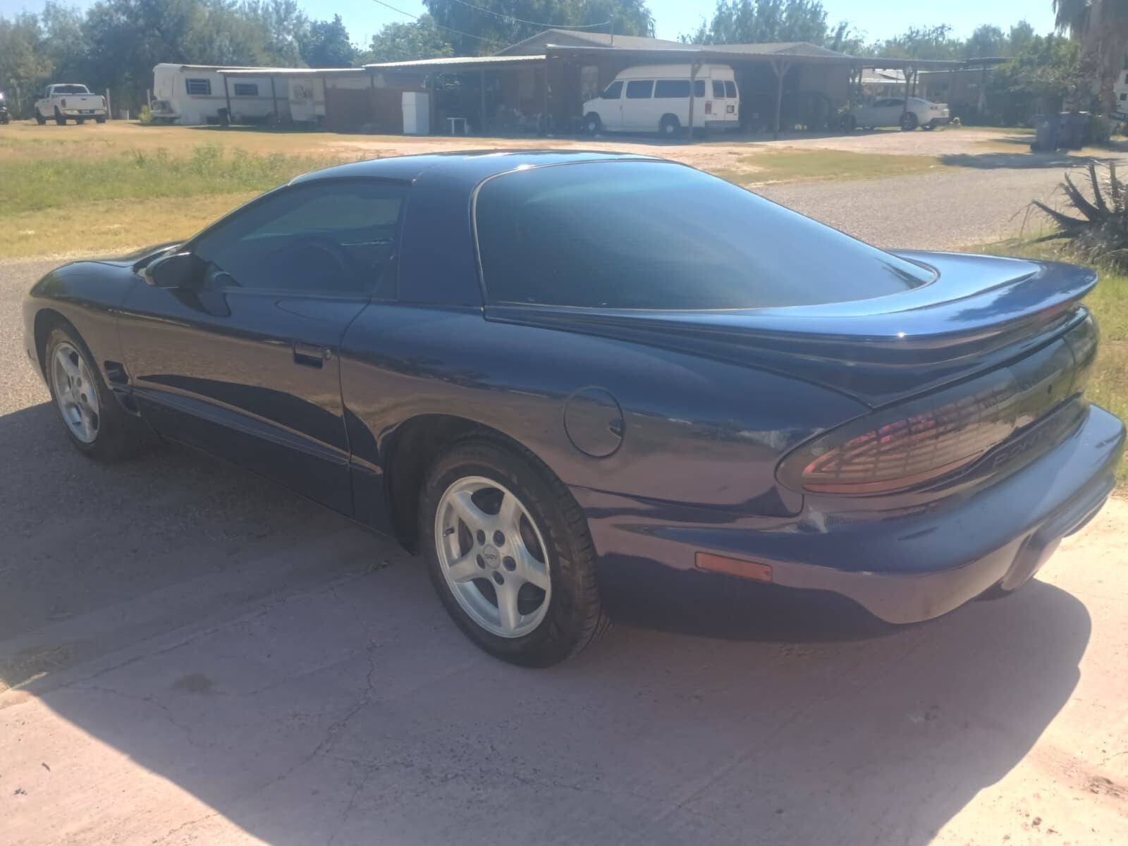 Blue 1924 Pontiac Trans Am with Gray interior