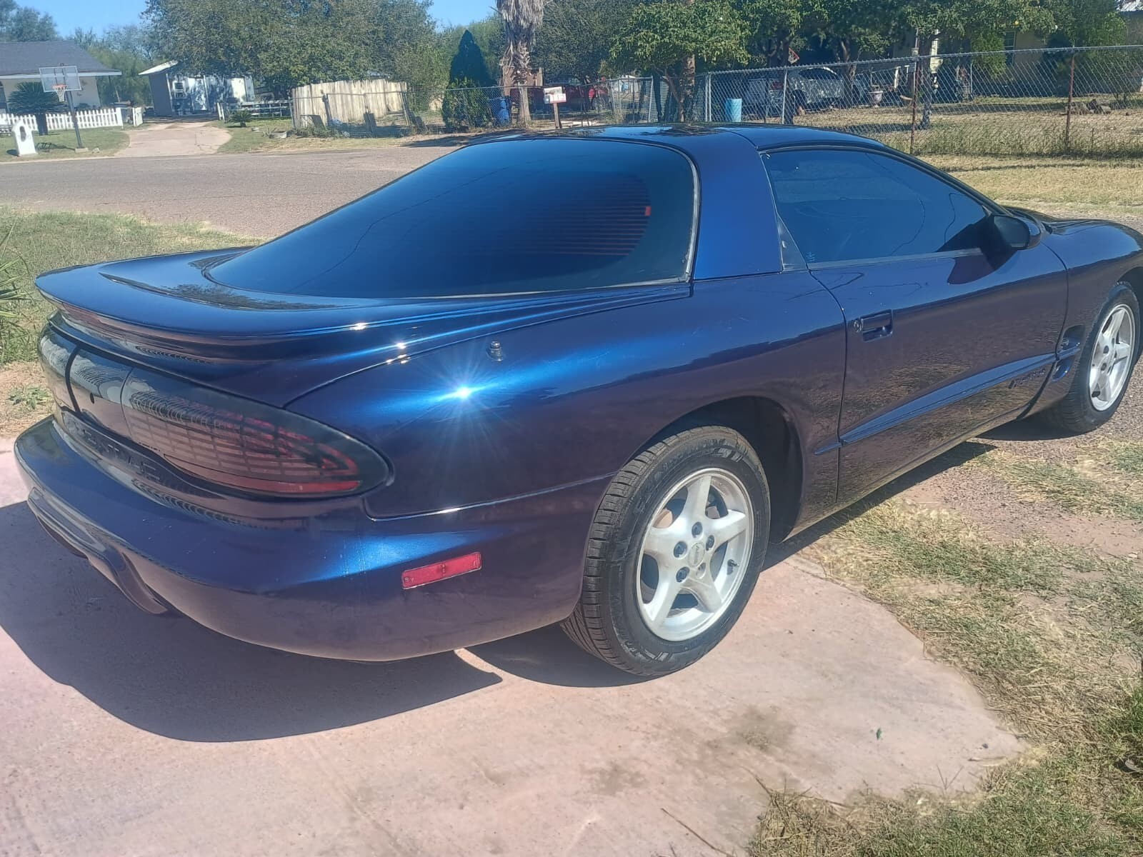 Blue 1924 Pontiac Trans Am with Gray interior