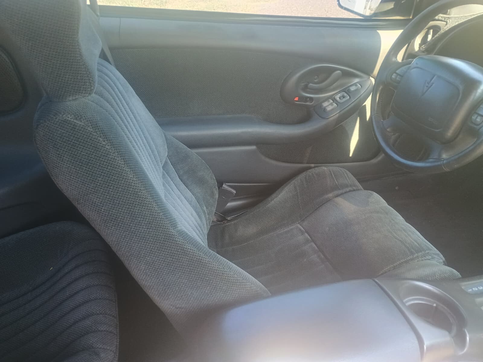 Blue 1924 Pontiac Trans Am with Gray interior