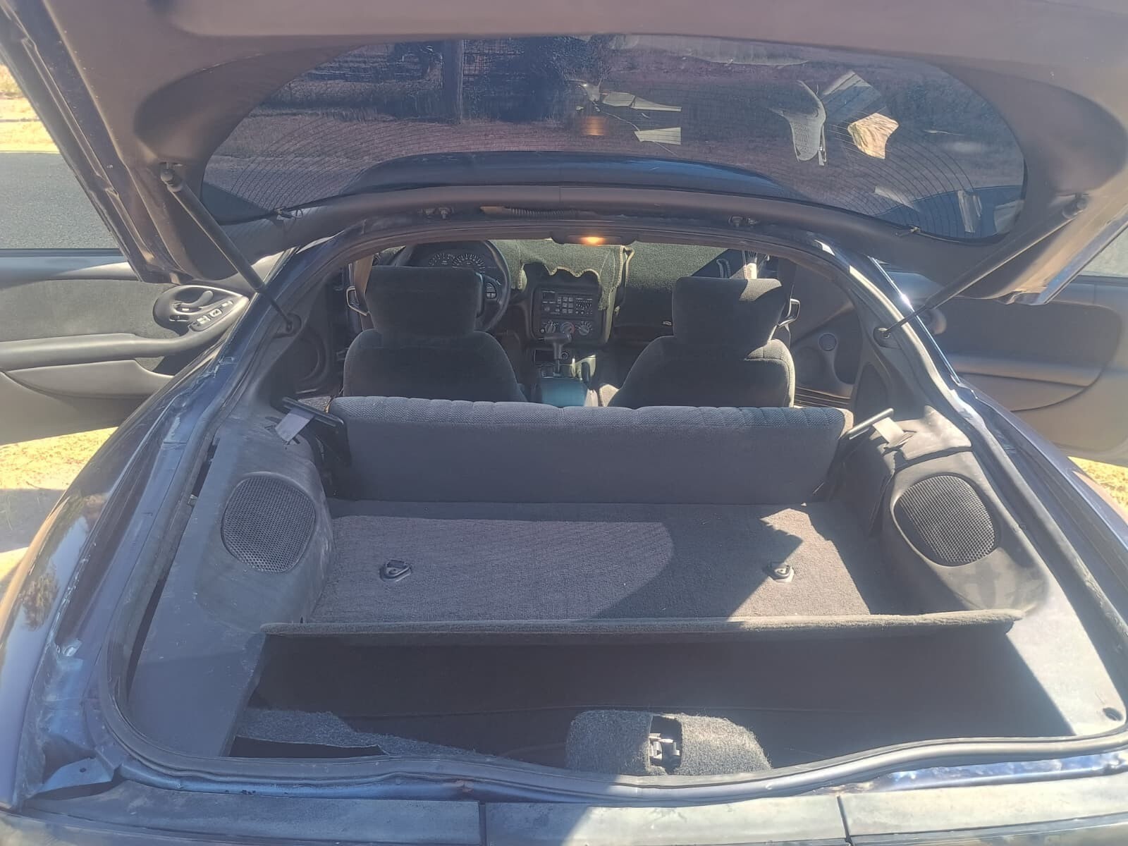 Blue 1924 Pontiac Trans Am with Gray interior