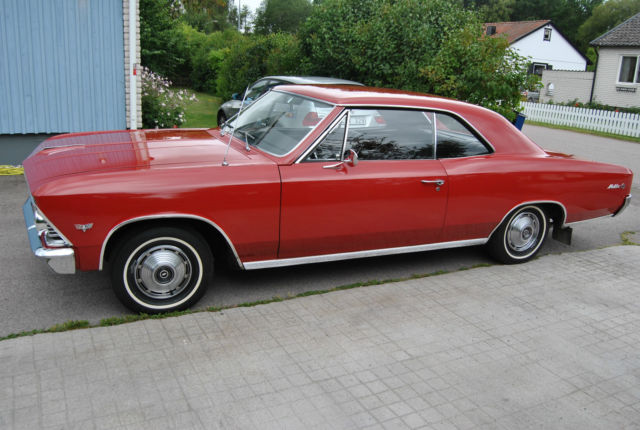 Red 1966 Chevrolet Chevelle Coupe with Black interior