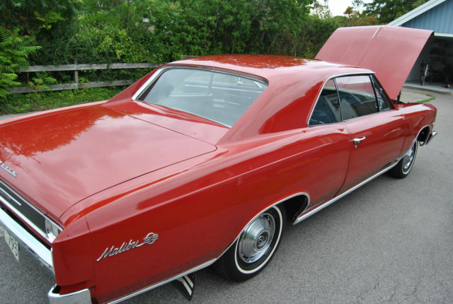 Red 1966 Chevrolet Chevelle Coupe with Black interior