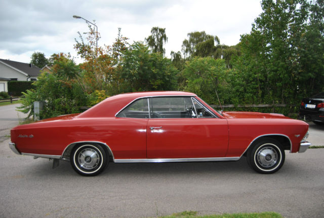 Red 1966 Chevrolet Chevelle Coupe with Black interior