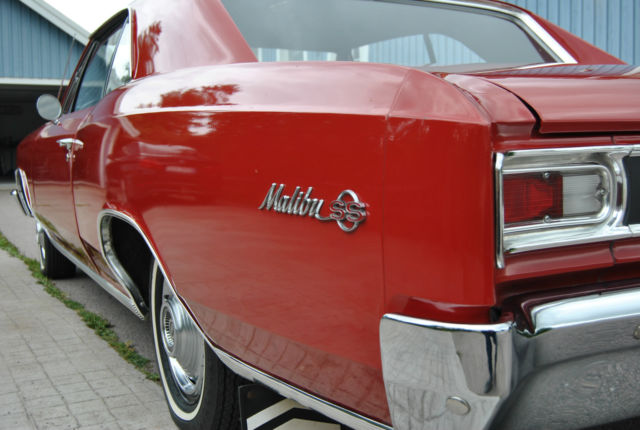 Red 1966 Chevrolet Chevelle Coupe with Black interior