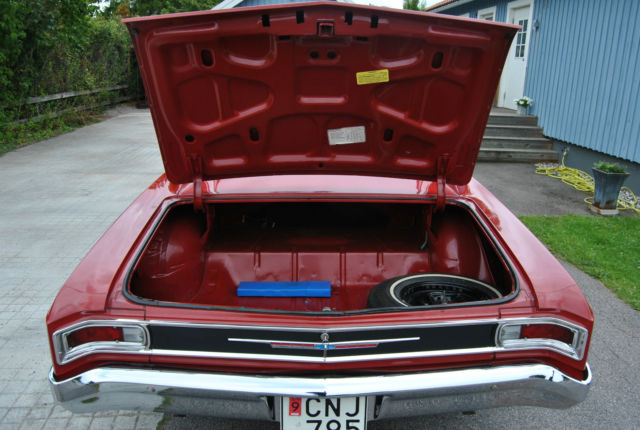 Red 1966 Chevrolet Chevelle Coupe with Black interior