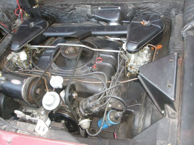 Metallic Burgandy 1964 Chevrolet Corvair Convertible with Black interior