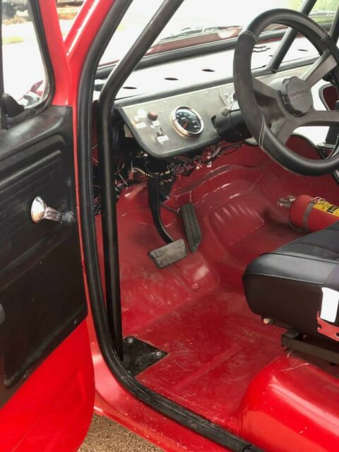 red with black trim 1978 Chevrolet C-10 short bed with black interior