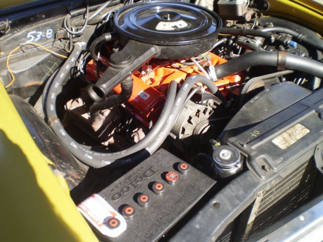 Gold 1971 Chevrolet Nova Coupe with Black interior