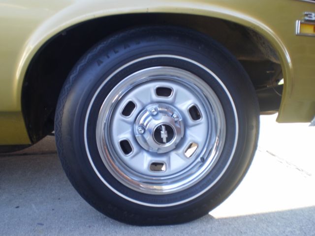 Gold 1971 Chevrolet Nova Coupe with Black interior