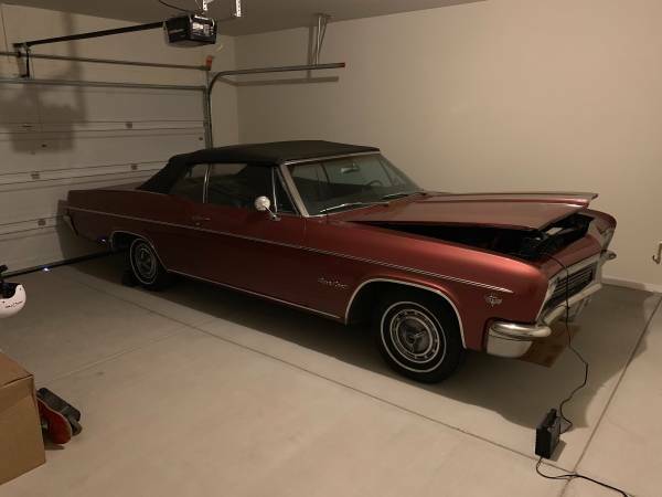Burgundy 1966 Chevrolet Impala Coupe with Black interior