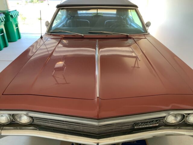 Burgundy 1966 Chevrolet Impala Coupe with Black interior