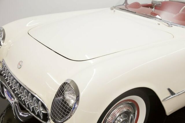 White 1954 Chevrolet Corvette Convertible with Red interior