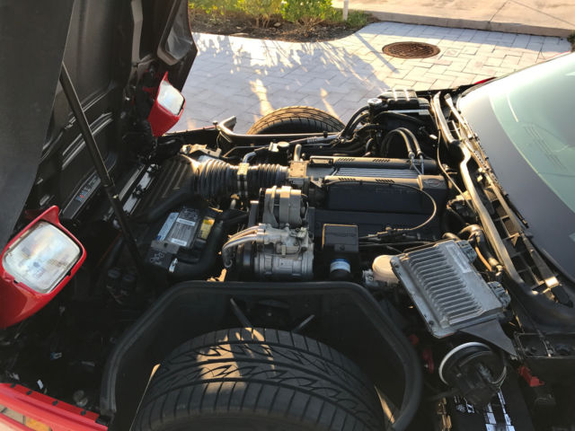 Red 1994 Chevrolet Corvette Coupe with Red interior