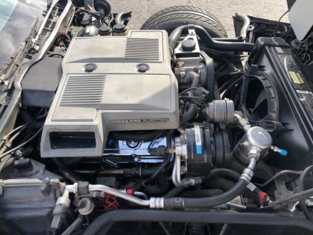 Silver 1984 Chevrolet Corvette Coupe with Gray interior