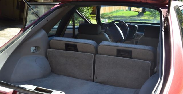 Red 1990 Ford Mustang Hatchback with Gray interior