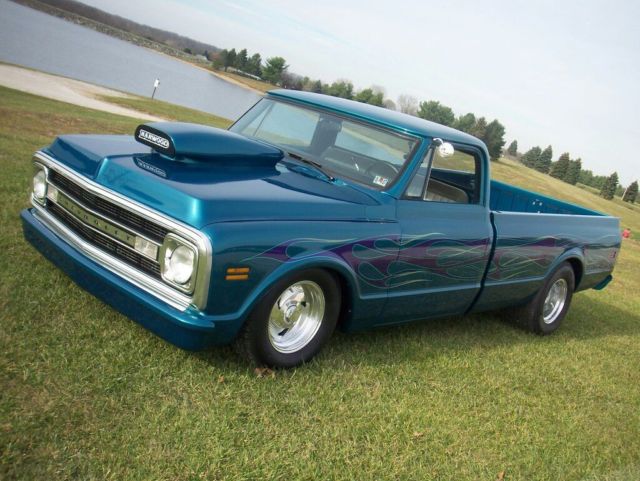 dark blue green terquois 1970 Chevrolet C-10 truck with grey and terquois interior