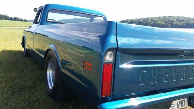 dark blue green terquois 1970 Chevrolet C-10 truck with grey and terquois interior