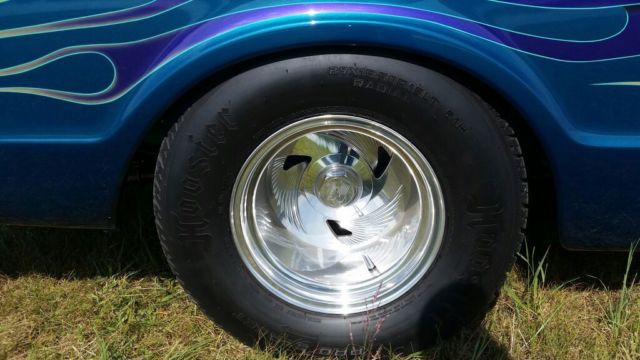 dark blue green terquois 1970 Chevrolet C-10 truck with grey and terquois interior
