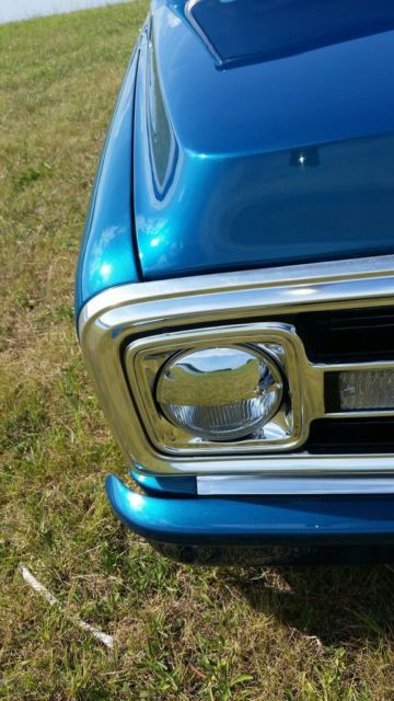 dark blue green terquois 1970 Chevrolet C-10 truck with grey and terquois interior