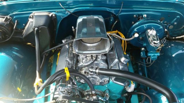 dark blue green terquois 1970 Chevrolet C-10 truck with grey and terquois interior