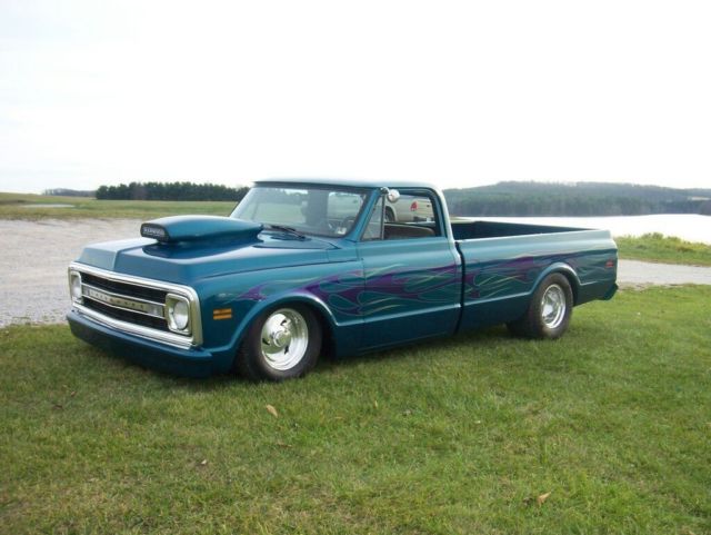 dark blue green terquois 1970 Chevrolet C-10 truck with grey and terquois interior