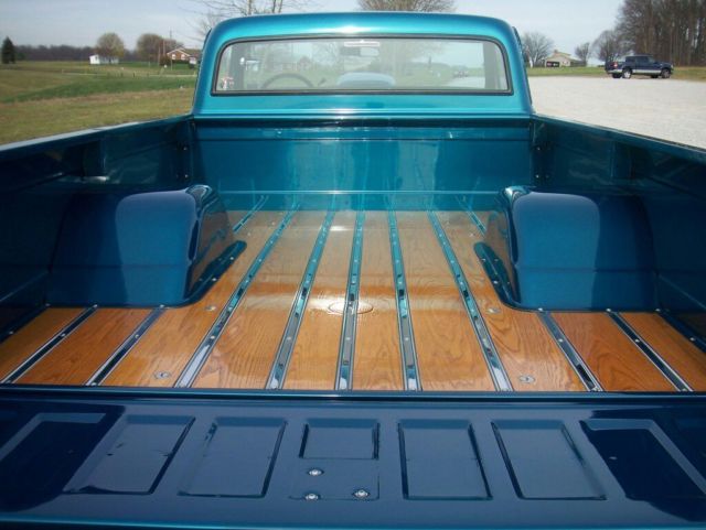 dark blue green terquois 1970 Chevrolet C-10 truck with grey and terquois interior