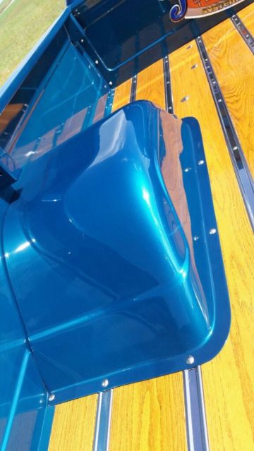 dark blue green terquois 1970 Chevrolet C-10 truck with grey and terquois interior