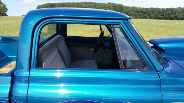 dark blue green terquois 1970 Chevrolet C-10 truck with grey and terquois interior