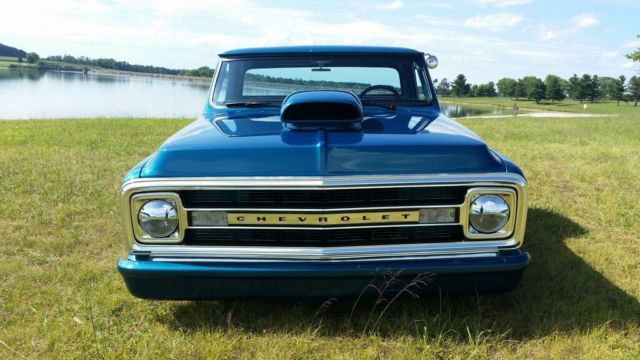 dark blue green terquois 1970 Chevrolet C-10 truck with grey and terquois interior