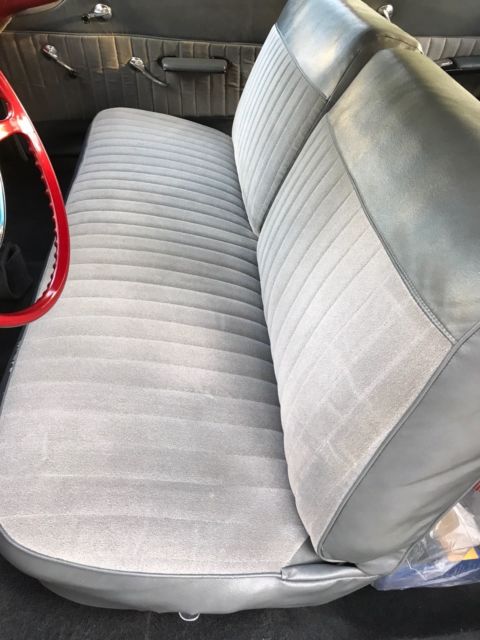 Red 1960 Chevrolet Impala Sedan with Blue interior