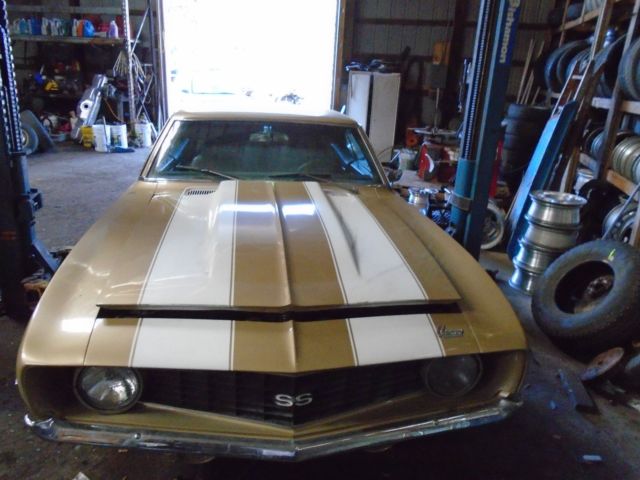 Olympic gold 1969 Chevrolet Camaro Coupe with Green interior