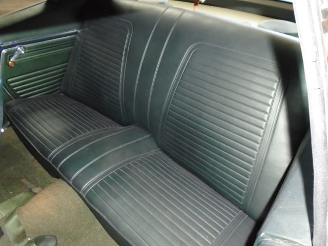Olympic gold 1969 Chevrolet Camaro Coupe with Green interior