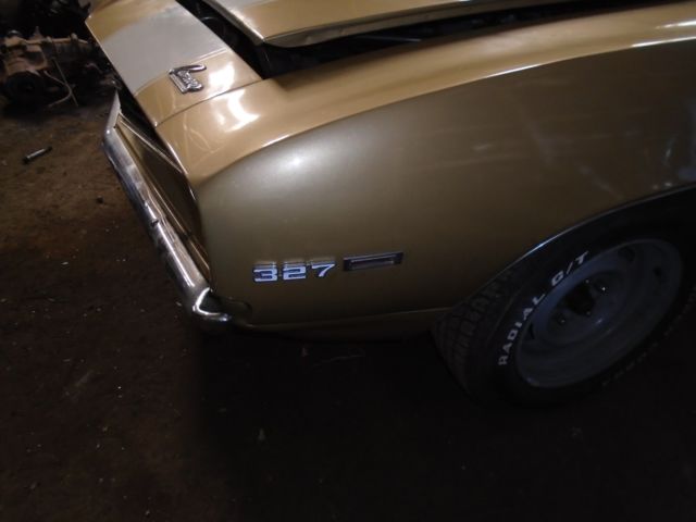 Olympic gold 1969 Chevrolet Camaro Coupe with Green interior