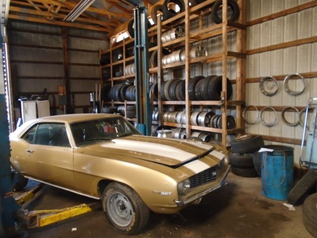 Olympic gold 1969 Chevrolet Camaro Coupe with Green interior