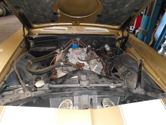 Olympic gold 1969 Chevrolet Camaro Coupe with Green interior