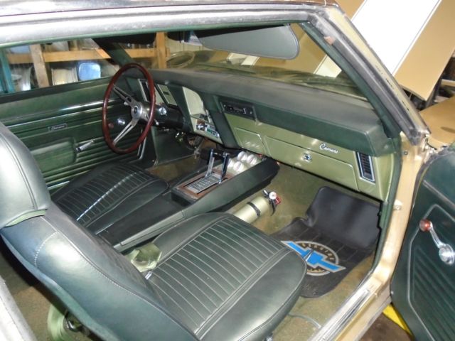 Olympic gold 1969 Chevrolet Camaro Coupe with Green interior