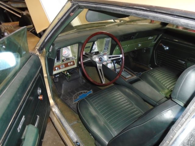 Olympic gold 1969 Chevrolet Camaro Coupe with Green interior