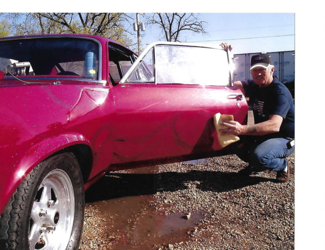 2000 Red w/ Magenta ghost flames 1971 Chevrolet Nova