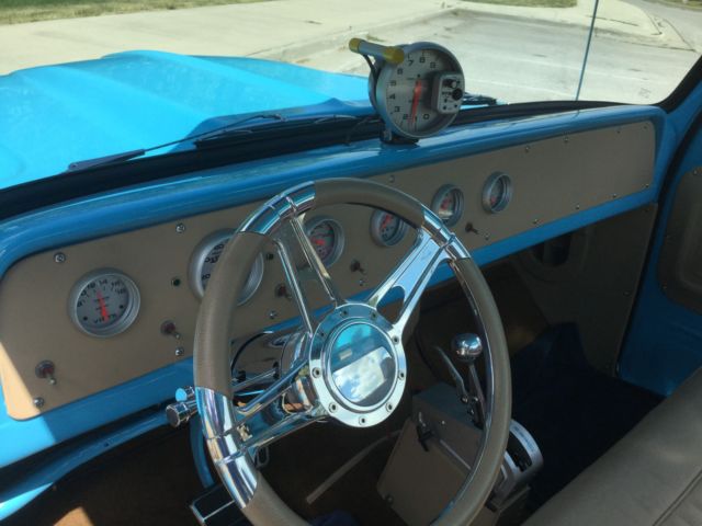 blue 1965 Chevrolet C-10 SB pickup with Tan interior