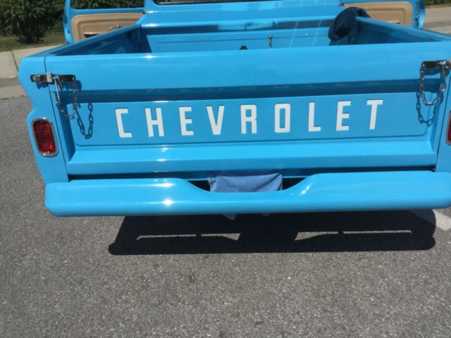 blue 1965 Chevrolet C-10 SB pickup with Tan interior