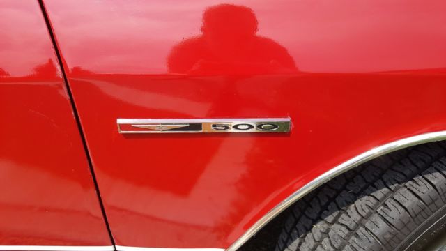 Red 1965 Chevrolet Corvair Sedan with White interior