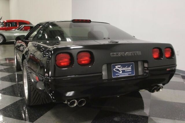 Black 1991 Chevrolet Corvette Coupe with Red interior