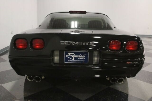 Black 1991 Chevrolet Corvette Coupe with Red interior
