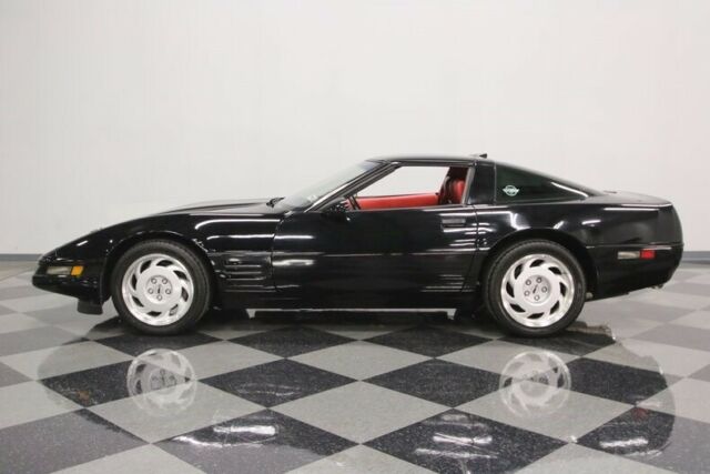 Black 1991 Chevrolet Corvette Coupe with Red interior