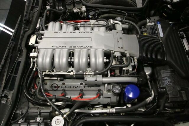 Black 1991 Chevrolet Corvette Coupe with Red interior