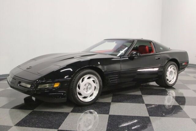 Black 1991 Chevrolet Corvette Coupe with Red interior