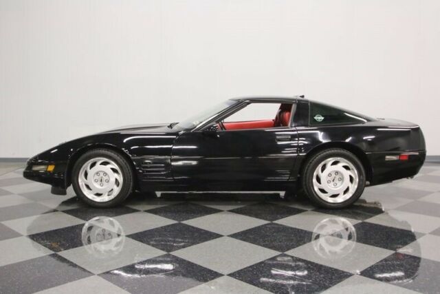 Black 1991 Chevrolet Corvette Coupe with Red interior