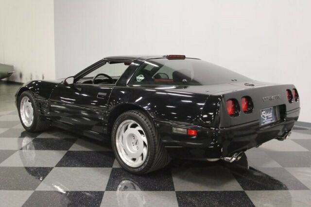 Black 1991 Chevrolet Corvette Coupe with Red interior